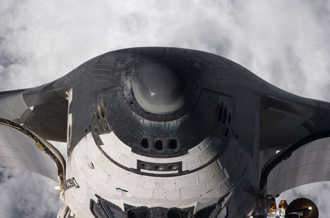 Astronauts Scan Shuttle for Space Debris Damage